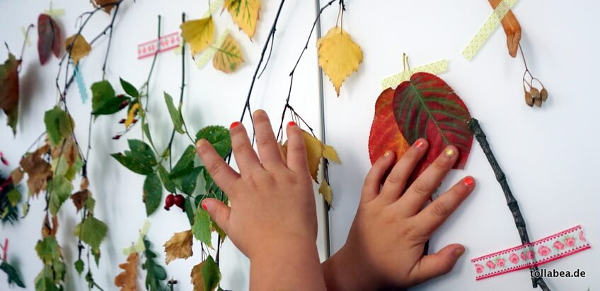 In Herbst basteln mit Kindern: Die Blätter-Künstlerwand mit Herbstlaub